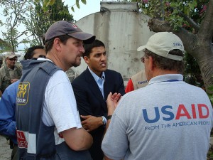 Shah with USAID volunteers